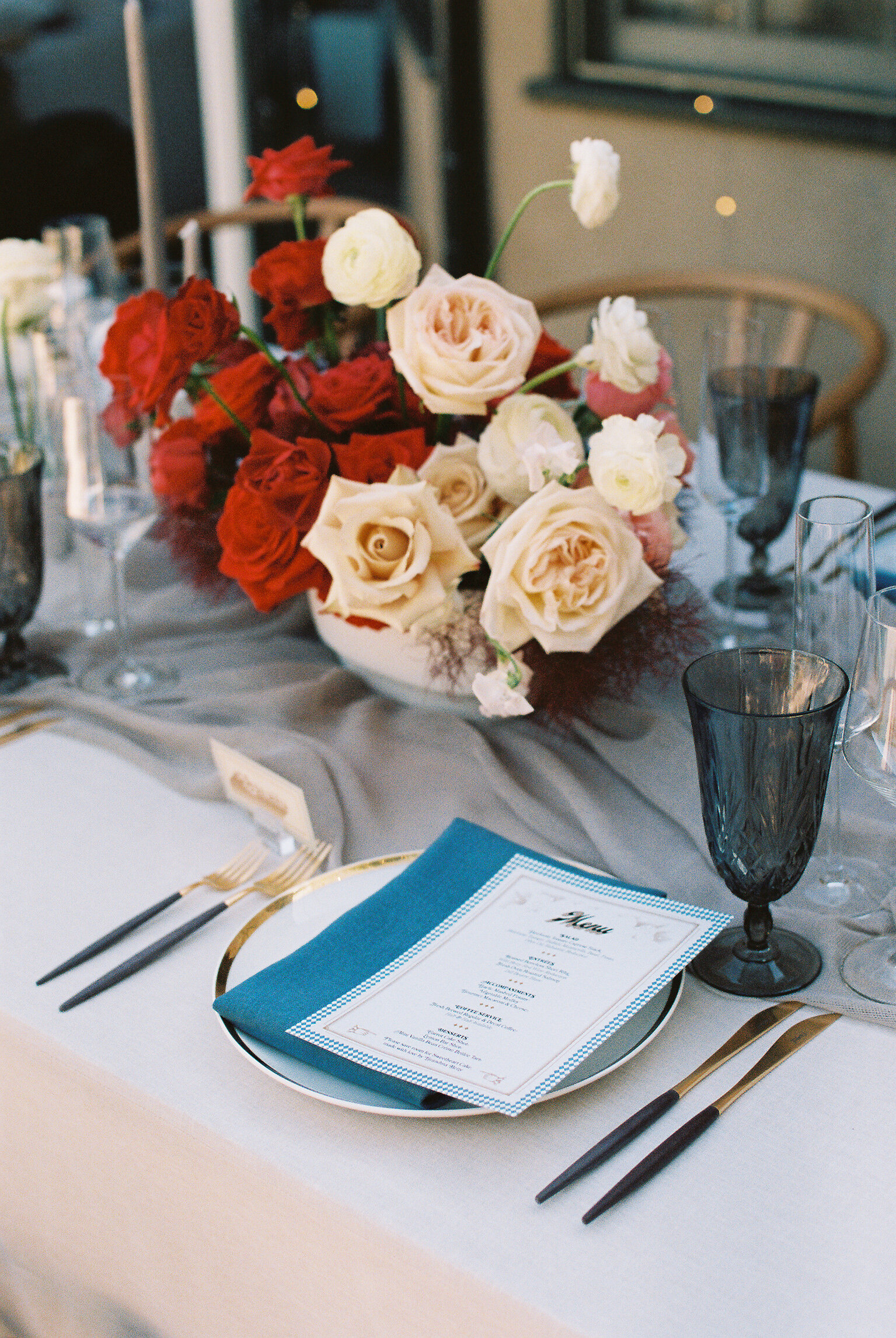Red and blush centerpiece with layered tablescape